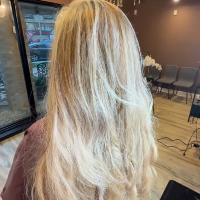 Long, full balayage styling at Chateau D'Elegance